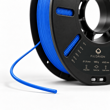 Filorion Reference HS ABS Mavi, 1.75 mm, 1 kg — makara ve filament ucu yakın görünümü