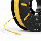 Filorion Reference HS ABS Sarı, 1.75 mm, 1 kg — makara ve filament ucu yakın görünümü