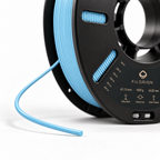 Filorion Reference PET-G Açık Mavi, 1.75 mm, 1 kg — makara ve filament ucu yakın görünümü