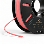 Filorion Reference PET-G Pembe, 1.75 mm, 1 kg — makara ve filament ucu yakın görünümü