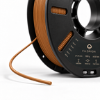 Filorion Reference PLA Pro Bakır, 1.75 mm, 1 kg — makara ve filament ucu yakın görünümü