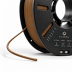 Filorion Reference PLA Pro Bronz, 1.75 mm, 1 kg — makara ve filament ucu yakın görünümü