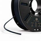 Filorion Reference PLA Pro Siyah, 1.75 mm, 1 kg — makara ve filament ucu yakın görünümü